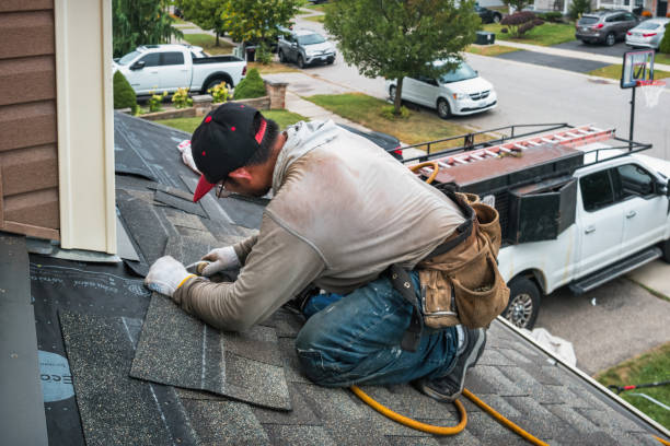 Professional Roof Replacement technician working in Barnstead, NH